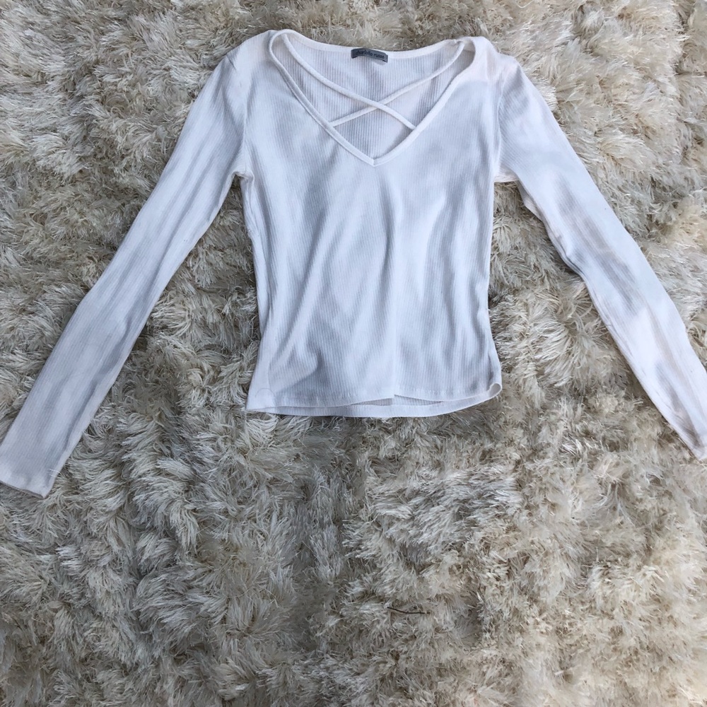 Charlotte Russe white crosses top.